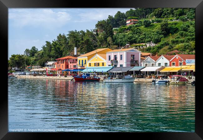 Colourful waterfront of Katakolon, Greece Framed Print by Angus McComiskey