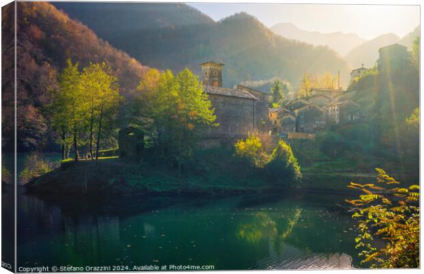 Isola Santa village and lake in autumn. Garfagnana, Italy Canvas Print by Stefano Orazzini
