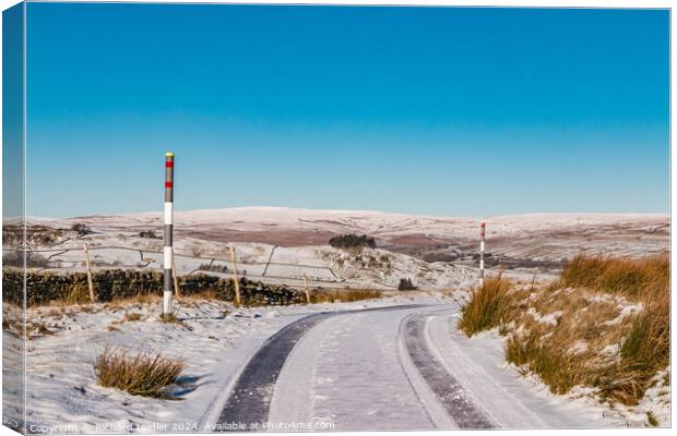 Kirkcarrion from Harker Hill in Snow Canvas Print by Richard Laidler