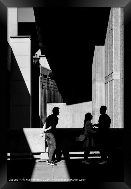 Shadows with three figures Framed Print by Mark Phillips