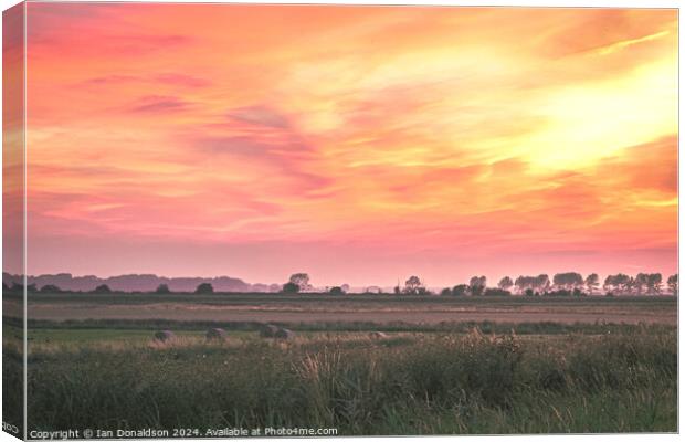 Norfolk Sunset Canvas Print by Ian Donaldson
