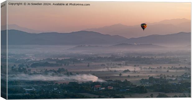 Sunrise balloon flight over Chiang Mai Canvas Print by Jo Sowden