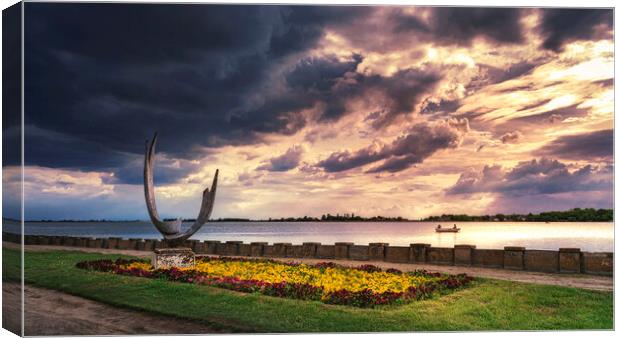 The sculpture Wings on the Palic lake under the cloudy sky Canvas Print by Dejan Travica