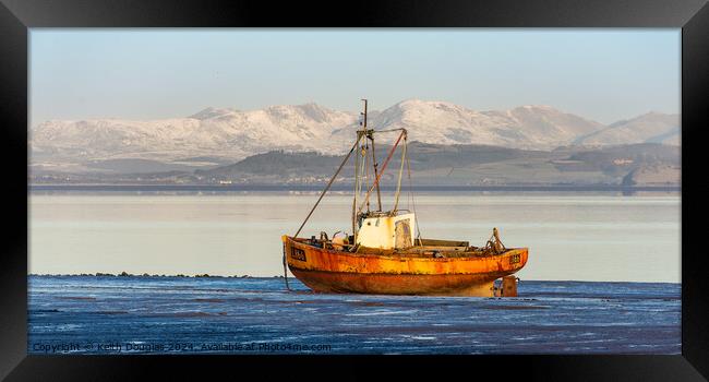 Boat at dawn in Morecambe Bay Framed Print by Keith Douglas