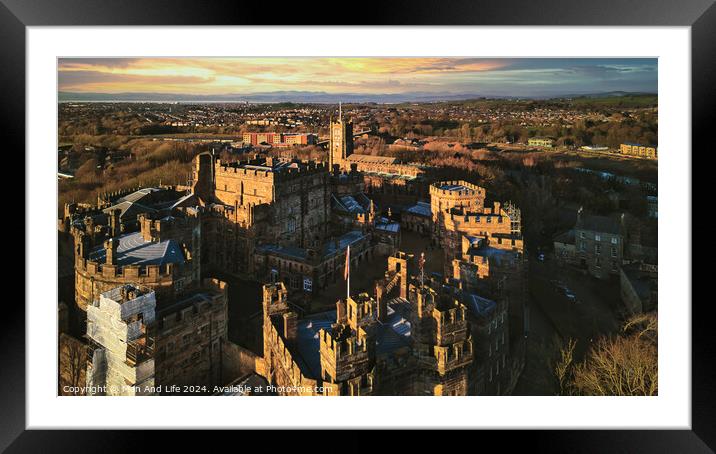 Aerial view of a historic castle at sunset with surrounding landscape and town under a golden sky in Lancaster. Framed Mounted Print by Man And Life