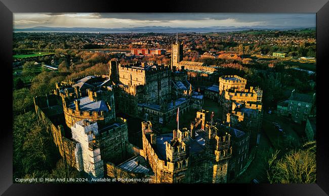 Aerial view of an ancient castle in Lancaster at sunset with lush greenery and a town in the background. Framed Print by Man And Life