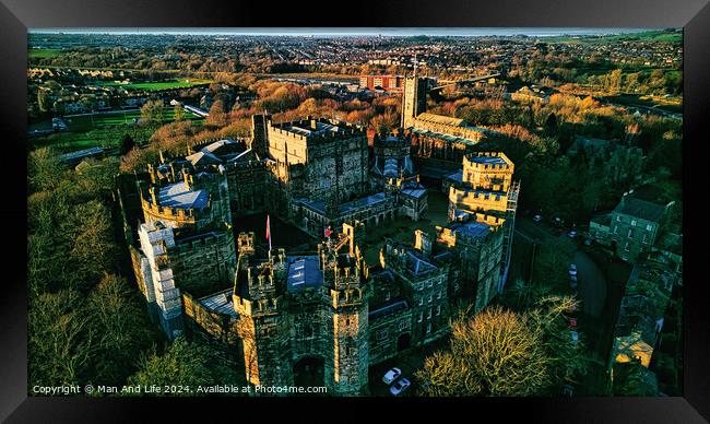 Aerial view of the Lancaster castle surrounded by lush greenery in a quaint town during sunset. Framed Print by Man And Life