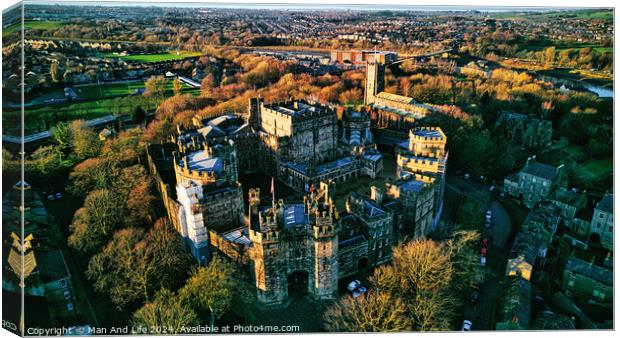 Aerial view of the Lancaster Castle amidst lush trees during sunset, with a panoramic backdrop of a quaint town. Canvas Print by Man And Life
