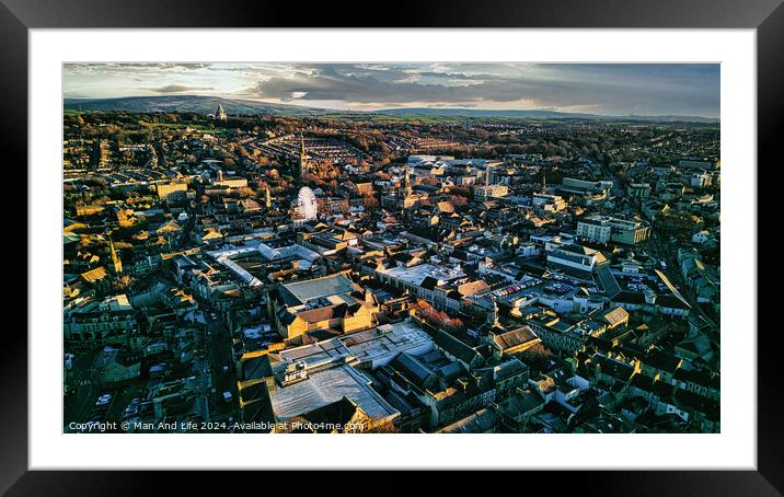 Aerial view of a city Lancaster at sunset with warm lighting highlighting the buildings and streets, showcasing the urban landscape. Framed Mounted Print by Man And Life