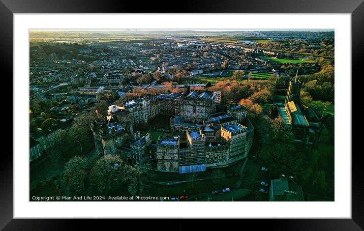 Aerial view of a historic Lancaster castle at sunset with surrounding cityscape and greenery. Framed Mounted Print by Man And Life