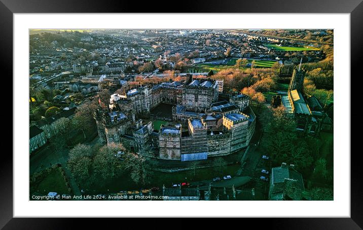 Aerial view of a historic Lancaster castle amidst a lush urban landscape at sunset. Framed Mounted Print by Man And Life