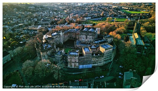 Aerial view of a historic Lancaster castle amidst a lush urban landscape at sunset. Print by Man And Life