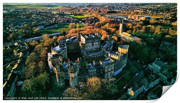 Aerial view of a majestic Lancaster castle surrounded by greenery with a town in the background during sunset. Print by Man And Life