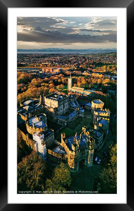 Aerial view of a historic Lancaster castle at sunset with surrounding gardens and distant cityscape. Framed Mounted Print by Man And Life