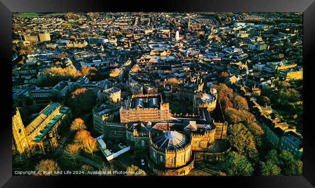 Aerial view of a historic city Lancaster at sunset with warm lighting highlighting architectural details and dense urban landscape. Framed Print by Man And Life
