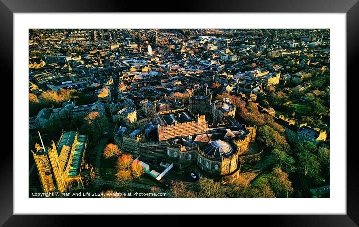 Aerial view of a historic Lancaster castle amidst a sprawling cityscape during golden hour, showcasing architectural beauty and urban density. Framed Mounted Print by Man And Life