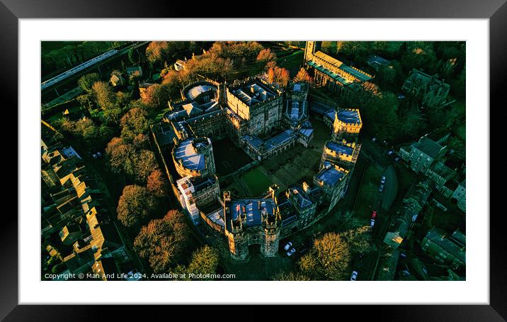 Aerial view of a majestic Lancaster castle surrounded by lush trees during golden hour, showcasing the historic architecture and scenic landscape. Framed Mounted Print by Man And Life