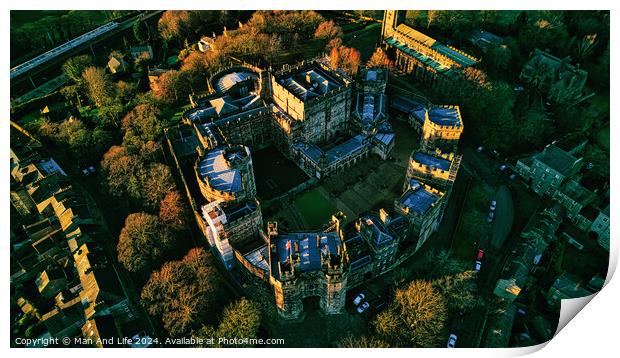 Aerial view of a majestic Lancaster castle surrounded by lush trees during golden hour, showcasing the historic architecture and scenic landscape. Print by Man And Life