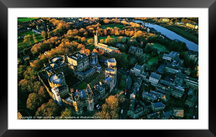 Aerial view of a historic Lancaster castle surrounded by greenery and a river at sunset. Framed Mounted Print by Man And Life