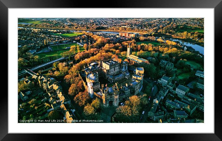 Aerial view of a historic Lancaster castle amidst a lush green landscape with surrounding urban area during golden hour. Framed Mounted Print by Man And Life