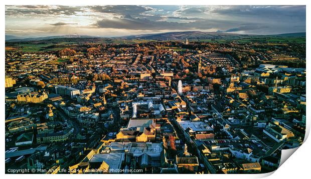 Aerial view of a city Lancaster at sunset with warm lighting, showcasing urban architecture and streets. Print by Man And Life
