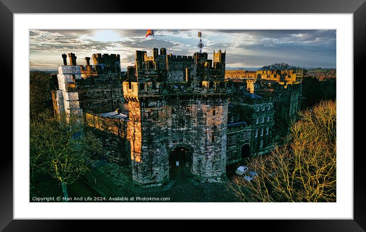 Historic medieval Lancaster castle at sunset with vibrant sky and lush greenery. Framed Mounted Print by Man And Life