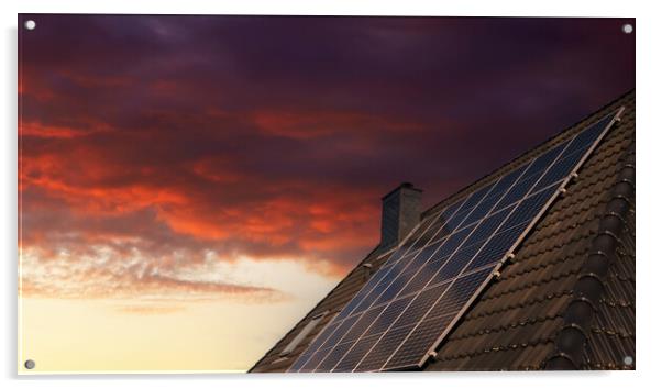 Solar panels producing clean energy on a roof of a residential house during sunset. Acrylic by Michael Piepgras