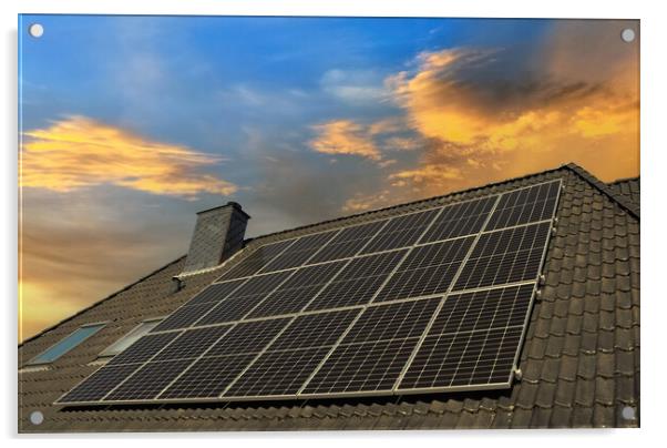 Solar panels producing clean energy on a roof of a residential house during sunset. Acrylic by Michael Piepgras