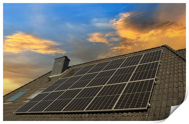 Solar panels producing clean energy on a roof of a residential house during sunset. Print by Michael Piepgras