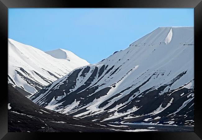 Snowy Mountain Landscape in Svalbard Framed Print by Martyn Arnold