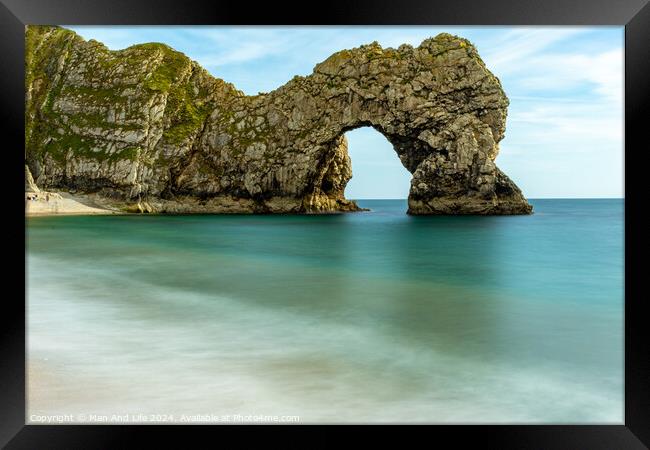 Durdle Door Framed Print by Man And Life