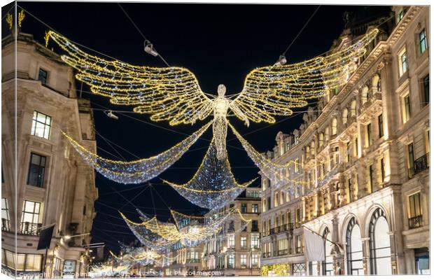 Angels Christmas lights in Regent street, London Canvas Print by Delphimages Art