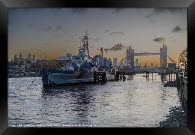 HMS Belfast, moored by Tower Bridge, London Framed Print by Adrian Victory-Daly