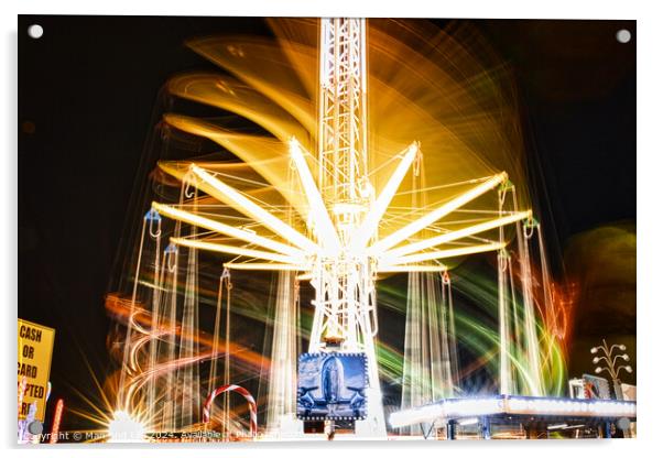 Long exposure of a brightly lit carousel at night, capturing motion blur of spinning lights at a fair. Acrylic by Man And Life