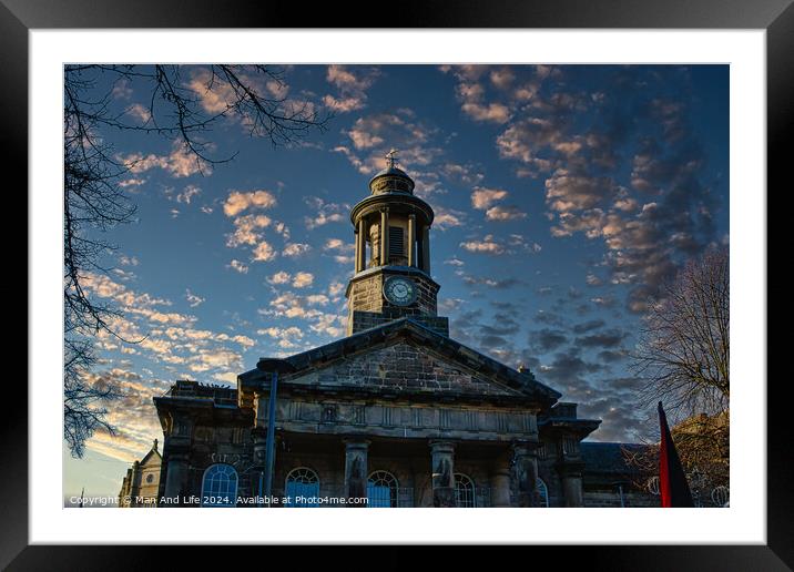 Historic stone building with clock tower against a dramatic sky at sunset in Lancaster. Framed Mounted Print by Man And Life