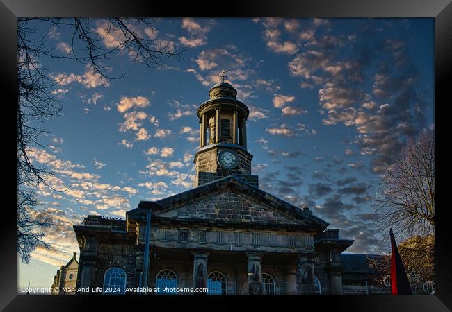 Historic stone building with clock tower against a dramatic sky at sunset in Lancaster. Framed Print by Man And Life