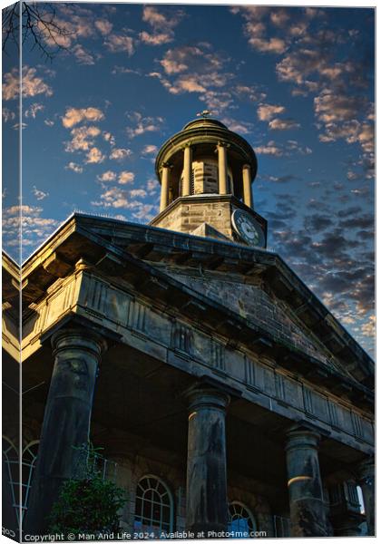 Historic building with a clock tower against a dramatic evening sky with scattered clouds in Lancaster. Canvas Print by Man And Life