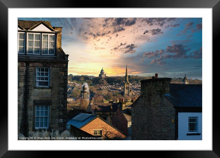 Picturesque sunset over a historic cityscape with silhouetted buildings and dramatic clouds in Lancaster. Framed Mounted Print by Man And Life