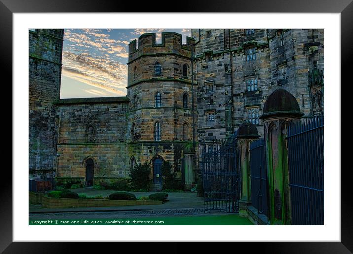 Historic stone castle at dusk with dramatic sky and greenery, suitable for travel and history themes in Lancaster. Framed Mounted Print by Man And Life