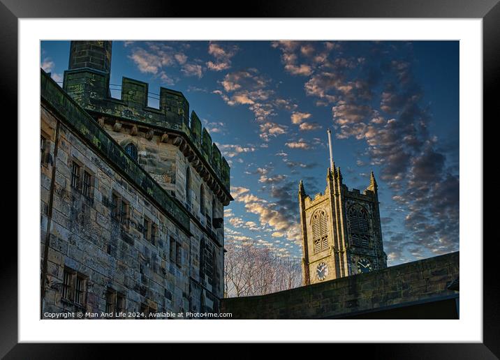 Historic stone buildings with towers against a dramatic sky at dusk in Lancaster. Framed Mounted Print by Man And Life