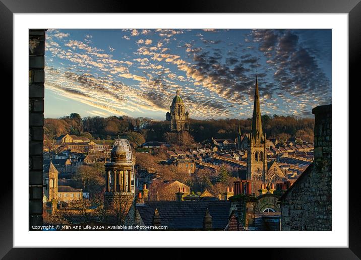 Historic cityscape at sunset with dramatic clouds, showcasing architectural landmarks and a warm golden light bathing the buildings in Lancaster. Framed Mounted Print by Man And Life