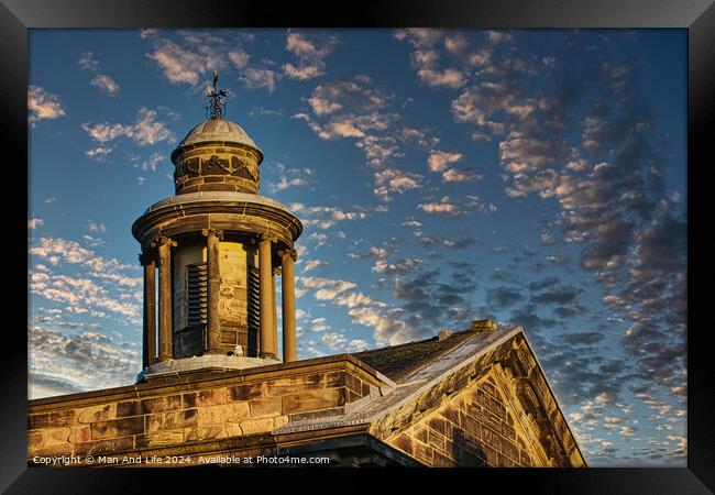 Historic stone building with a dome under a blue sky with scattered clouds at sunset in Lancaster. Framed Print by Man And Life