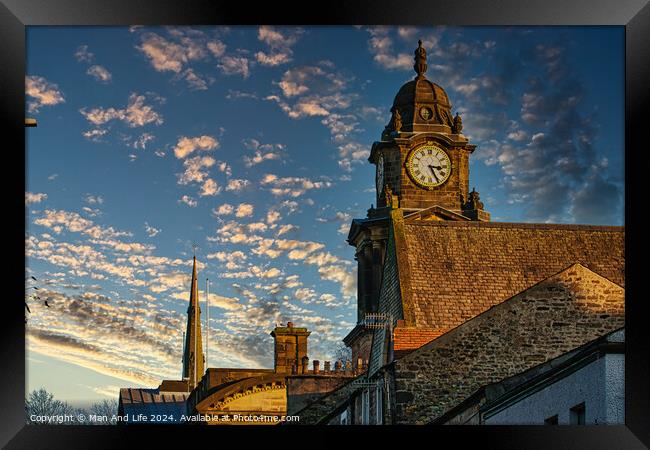 Historic clock tower against a vibrant sunset sky with scattered clouds in Lancaster. Framed Print by Man And Life