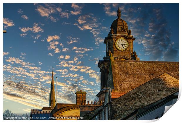 Historic clock tower against a vibrant sunset sky with scattered clouds in Lancaster. Print by Man And Life