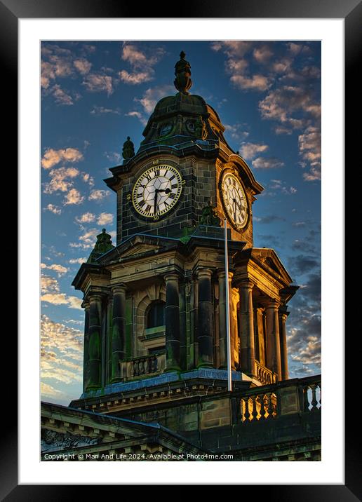 Historic clock tower against a dramatic sky at dusk, showcasing intricate architecture and timeless design in Lancaster. Framed Mounted Print by Man And Life