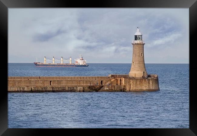 Tynemouth Lighthouse and North Pier   Framed Print by Martyn Arnold
