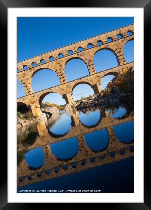 The Pont du Gard, vertical photography tilted over blue sky. Anc Framed Mounted Print by Laurent Renault