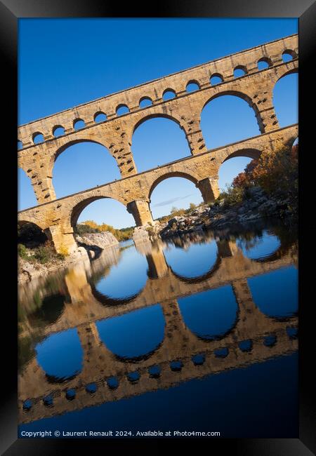 The Pont du Gard, vertical photography tilted over blue sky. Anc Framed Print by Laurent Renault