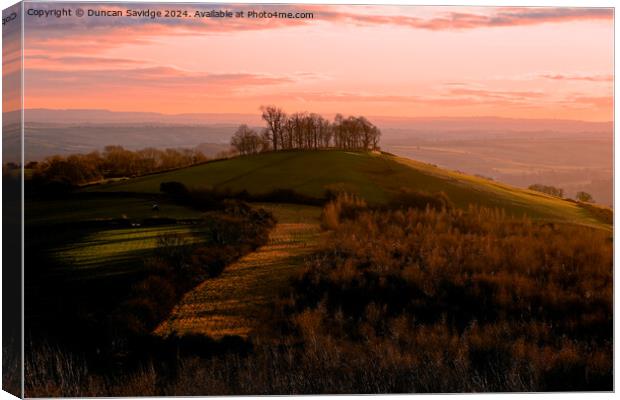 Sunset over Kelson Roundhill Canvas Print by Duncan Savidge