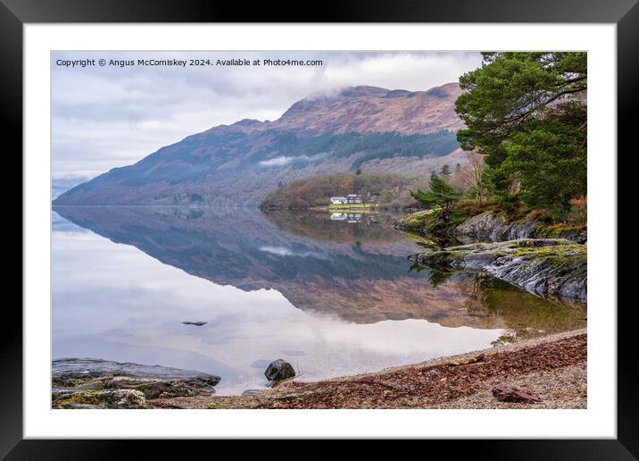 Winter reflections from the beach at Rowardennan Framed Mounted Print by Angus McComiskey